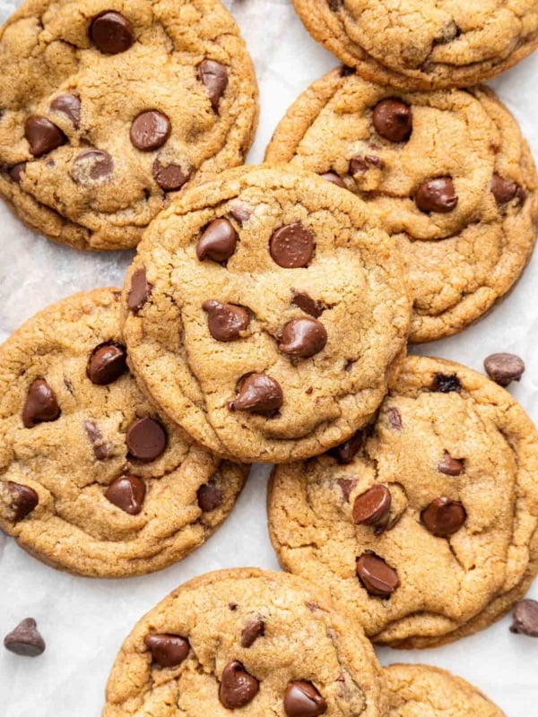 Overhead lay flat image of eggless chocolate chip cookies.