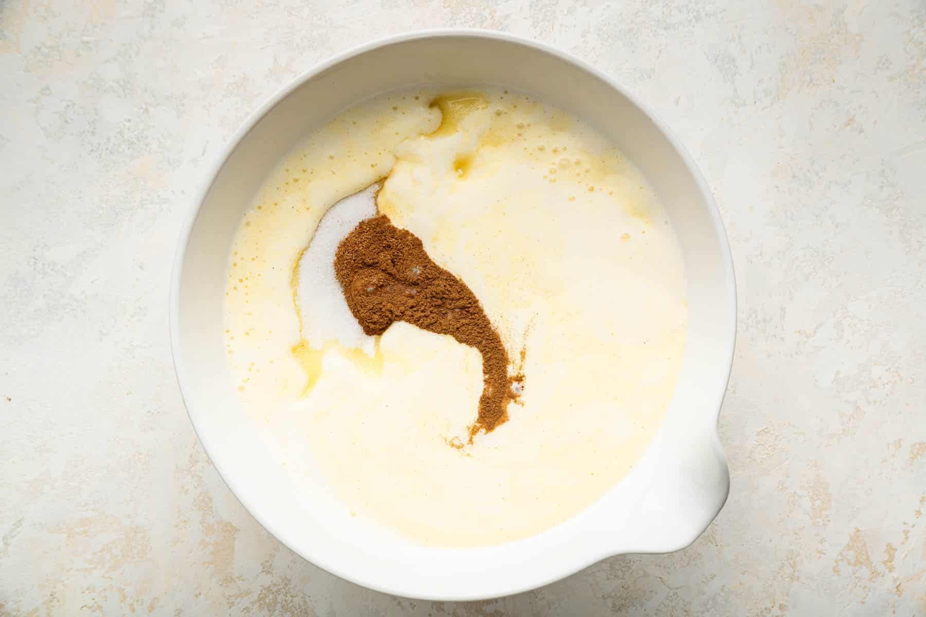 White bowl with cream and spices.
