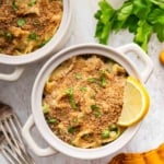 Two small casserole dishes of tuna noodle casserole no soup.